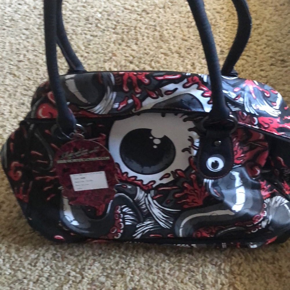 Iron fist skull bag
